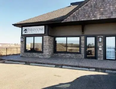 Exterior view of brick Parkstone Dental office building